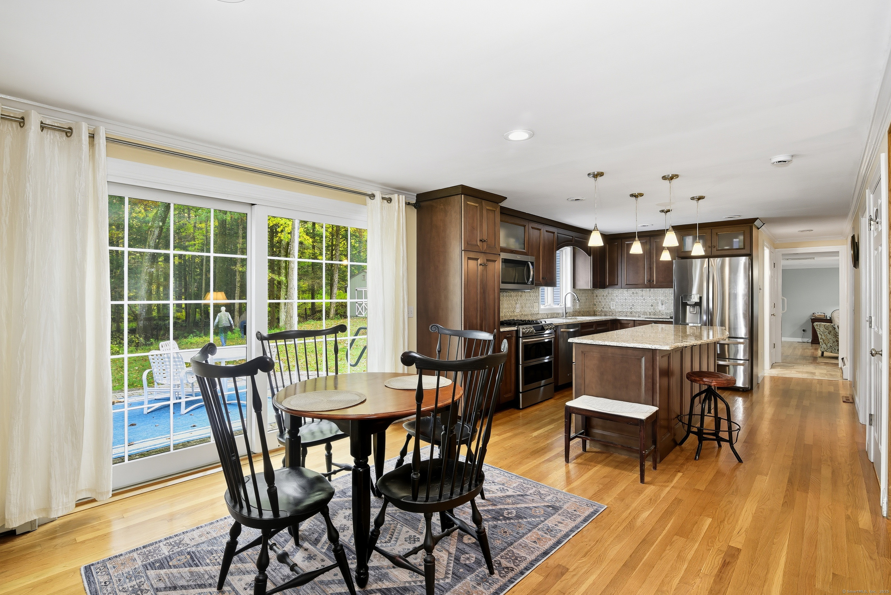26 Center Road Woodstock, CT 06281 - Photo 12 of 39 a view of a dining room with furniture window and wooden floor