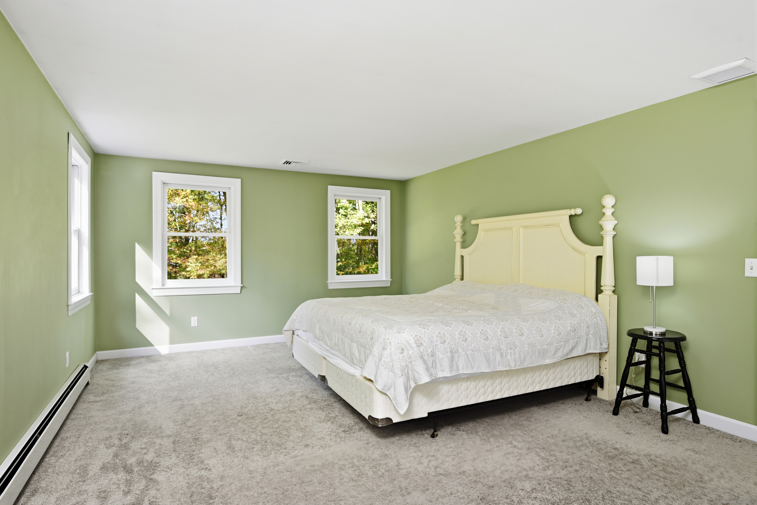 26 Center Road Woodstock, CT 06281 - Photo 22 of 39 a bedroom with a bed and a window