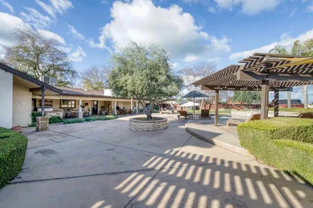 a bathroom with a shower and a sink