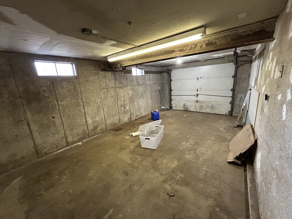 256 Old Webster Road, Unit 1 Oxford, MA 01540 - Photo 19 of 19 a view of a garage