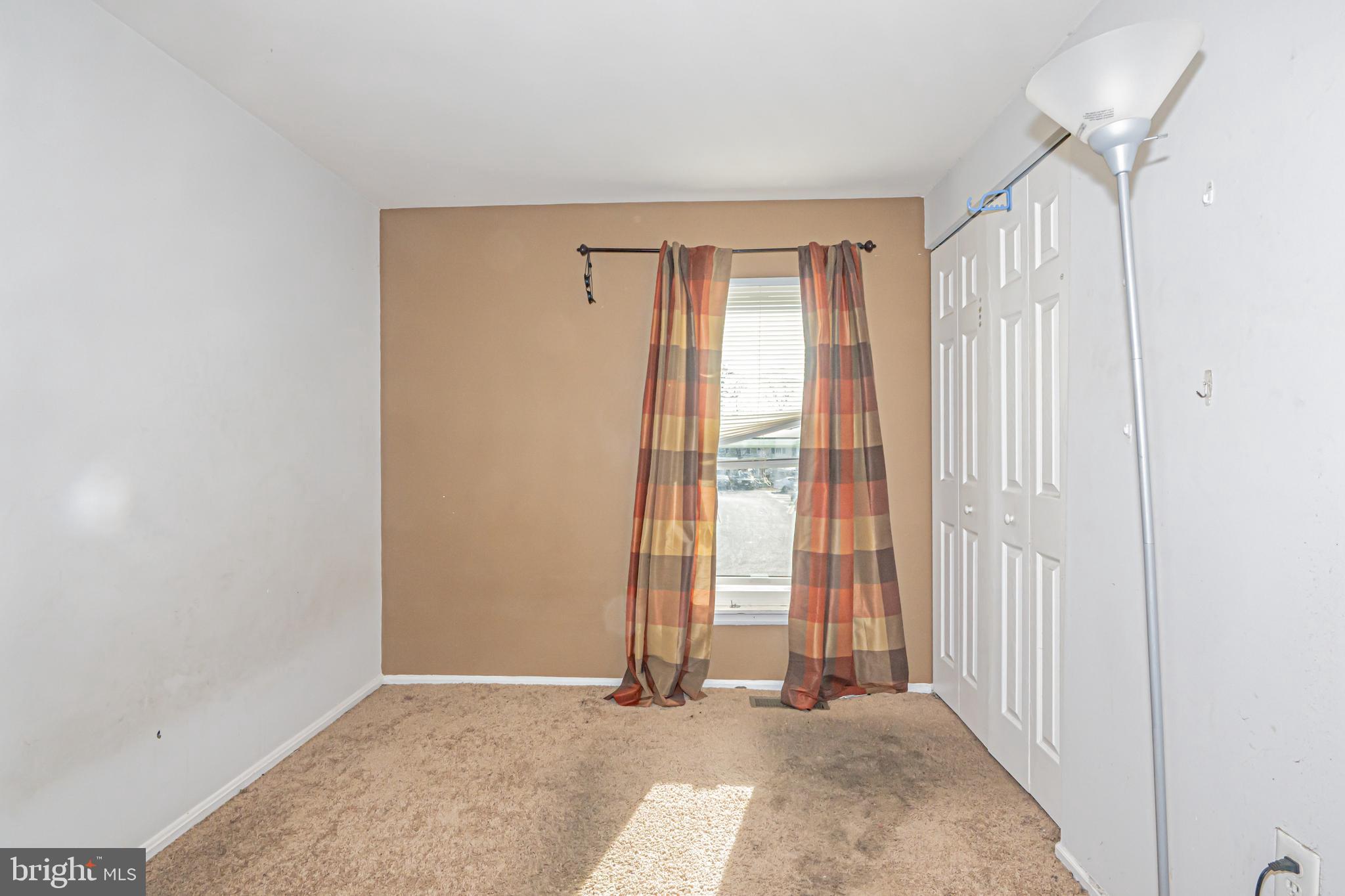 2637 Rooks Head Place Waldorf, MD 20602 - Photo 14 of 18 an empty room with windows