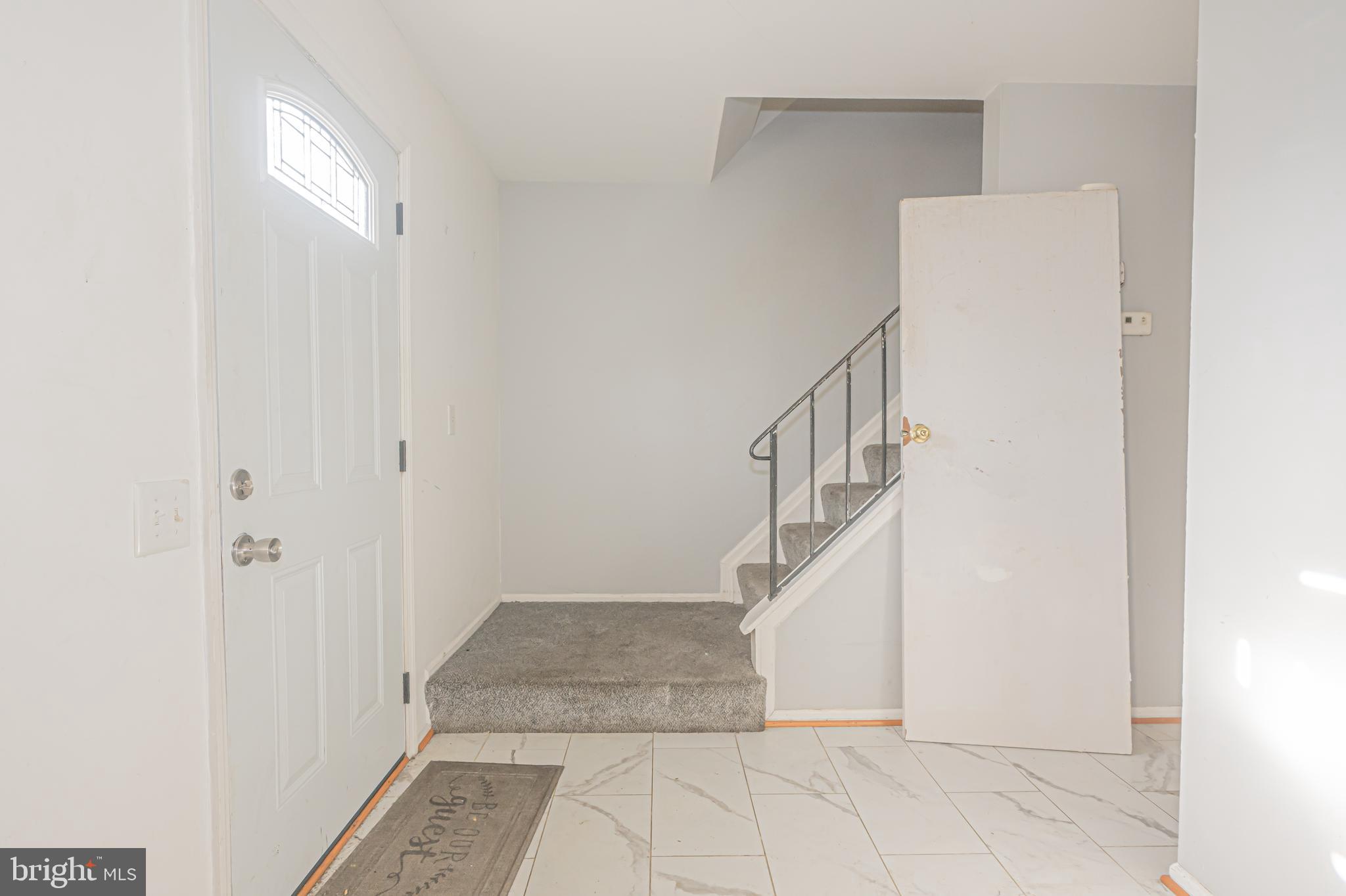 2637 Rooks Head Place Waldorf, MD 20602 - Photo 2 of 18 a view of entryway and hall with a window