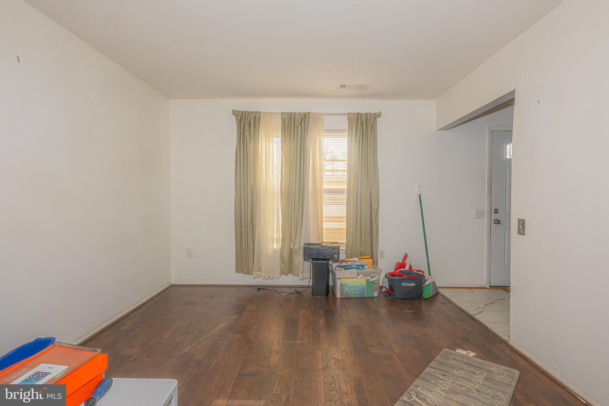 2637 Rooks Head Place Waldorf, MD 20602 - Photo 7 of 18 an empty room with windows