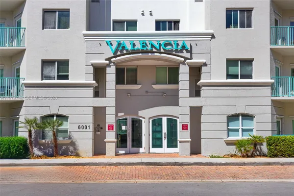 a front view of multi story residential apartment building