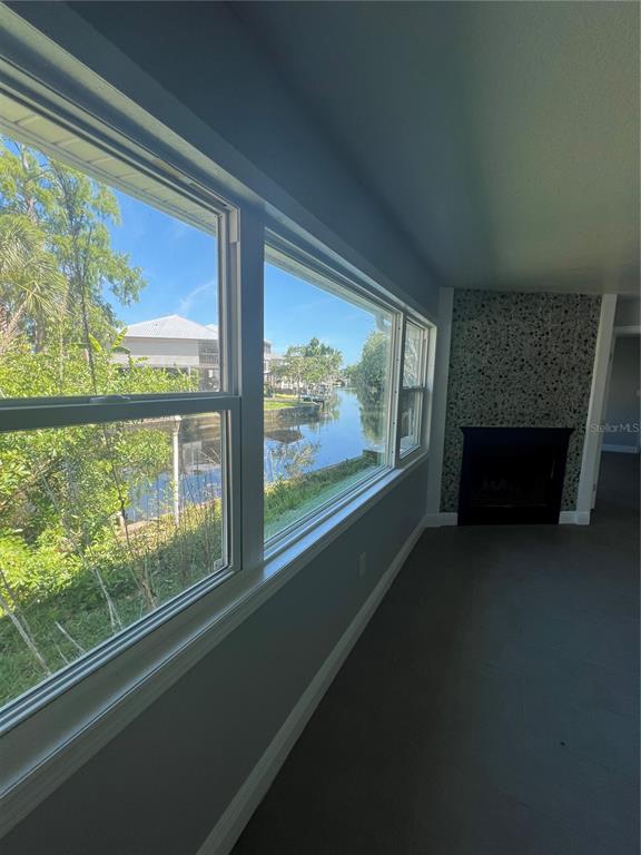 7222 Tropical Drive Weeki Wachee, FL 34607 - Photo 20 of 23 a living room with large windows