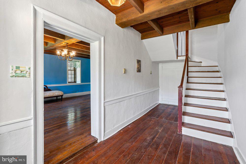 201 East Moyer Road Pottstown, PA 19464 - Photo 11 of 64 a view of a hallway view with wooden floor and staircase