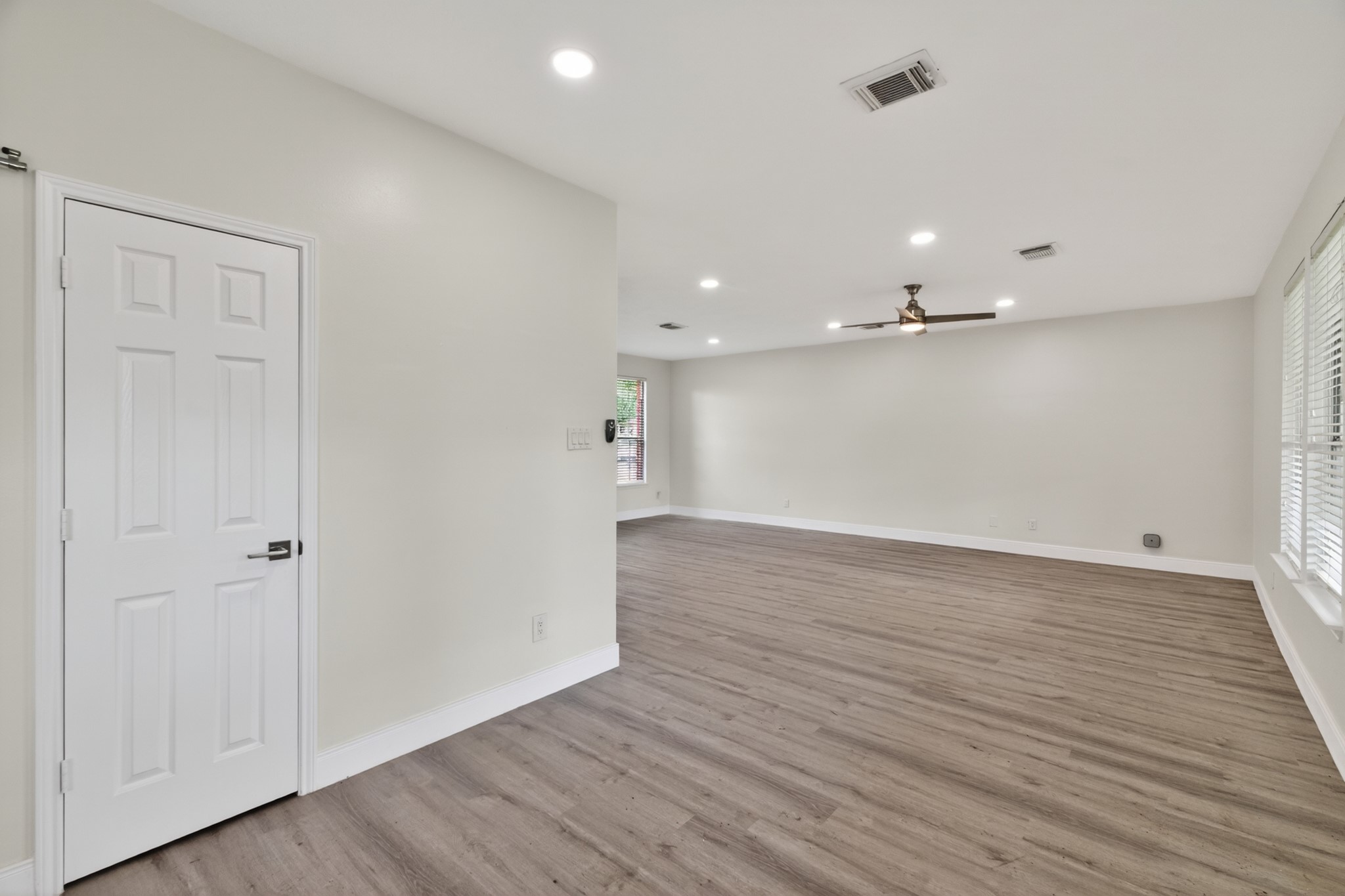 918 Ivycroft Lane Spring, TX 77373 - Photo 10 of 33 an empty room with wooden floor