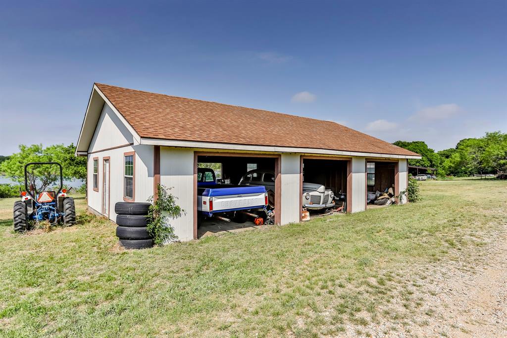 Tbd Shahan Prairie Road, Unit B Little Elm, TX 75068 - Photo 5 of 13 a view of a house with a yard and sitting area