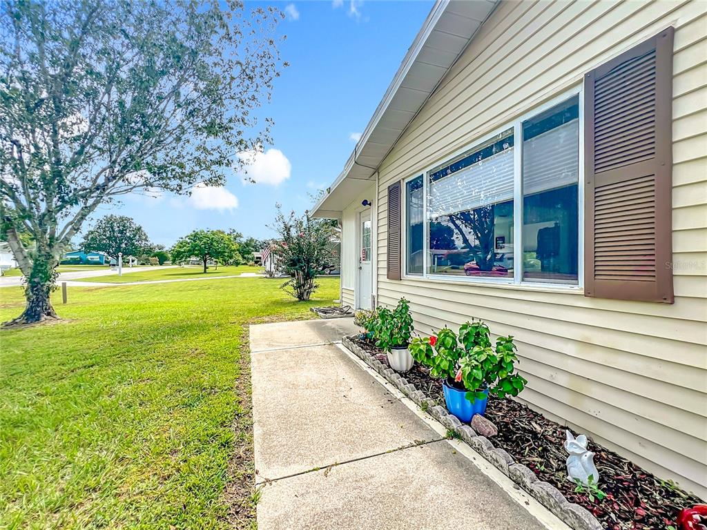 6468 Southwest 107th Place Ocala, FL 34476 - Photo 26 of 53 a view of a house with garden