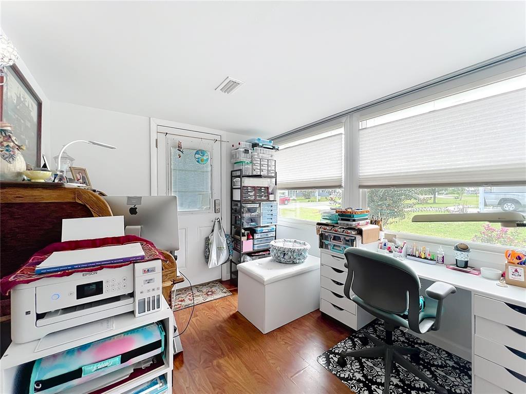 6468 Southwest 107th Place Ocala, FL 34476 - Photo 6 of 53 a room with furniture and a wooden floor