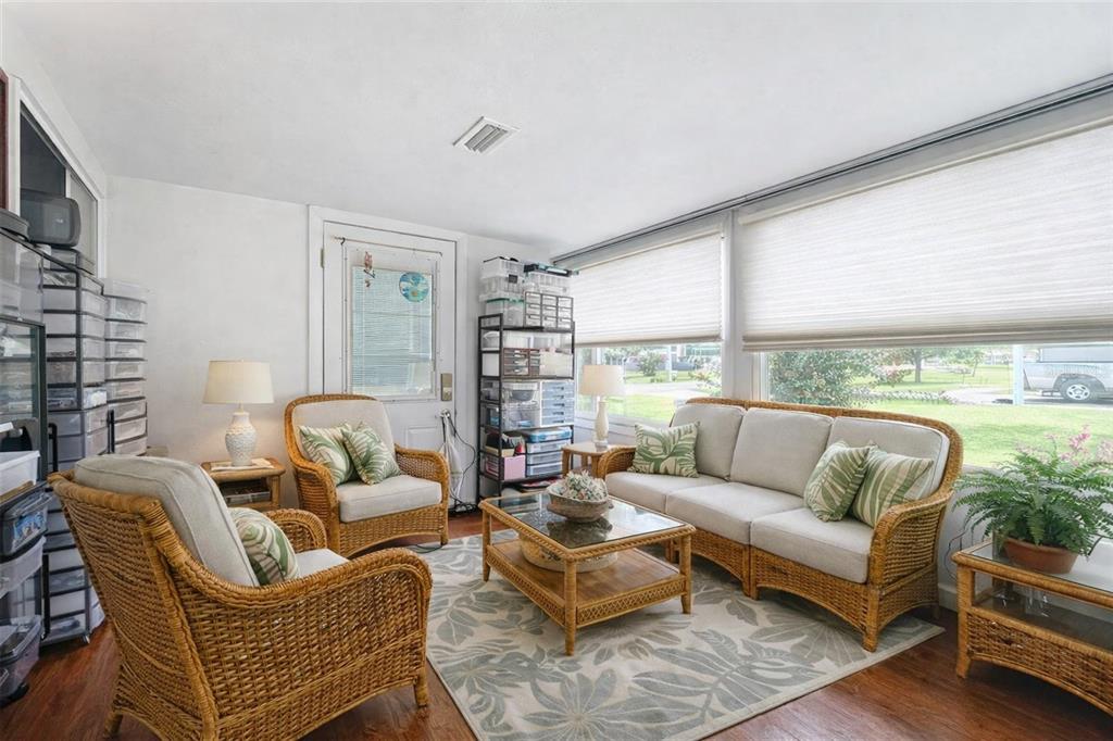 6468 Southwest 107th Place Ocala, FL 34476 - Photo 7 of 53 a living room with furniture and a large window