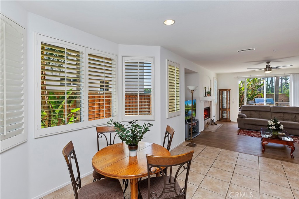 11416 Bridgeway Drive Riverside, CA 92505 - Photo 15 of 54 a view of a livingroom with furniture and a potted plant