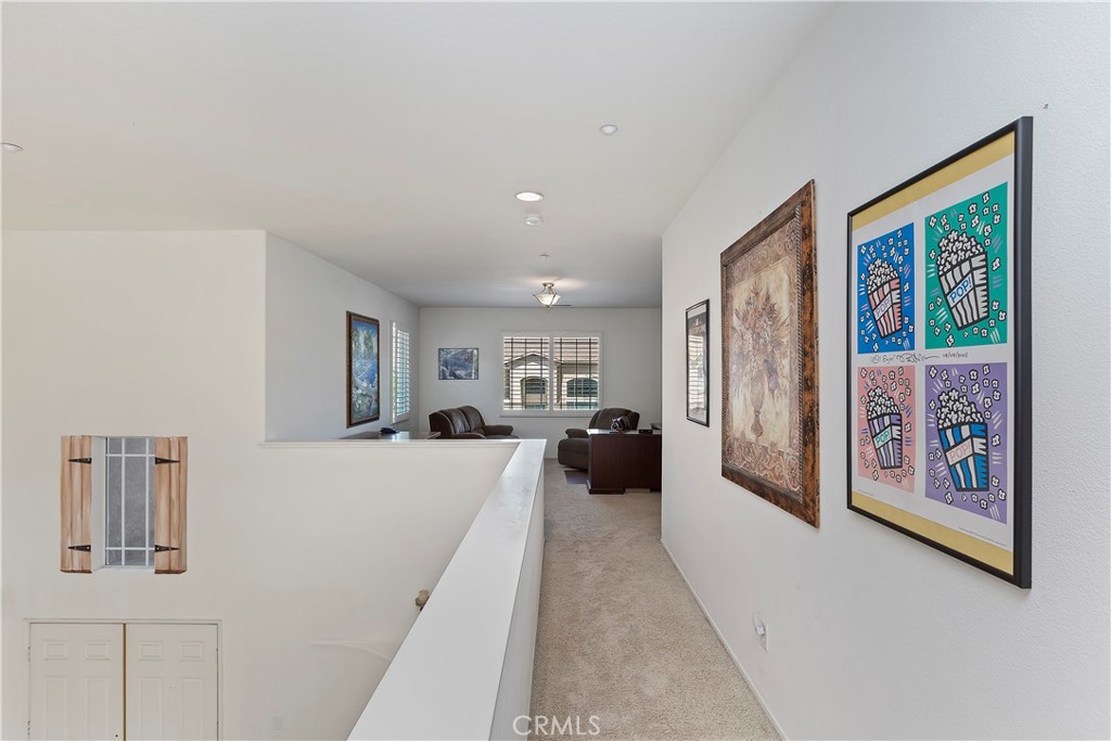 11416 Bridgeway Drive Riverside, CA 92505 - Photo 30 of 54 a view of a living room with furniture and a large window