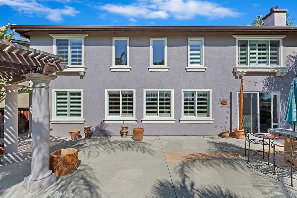 11416 Bridgeway Drive Riverside, CA 92505 - Photo 45 of 54 a front view of a house with many windows