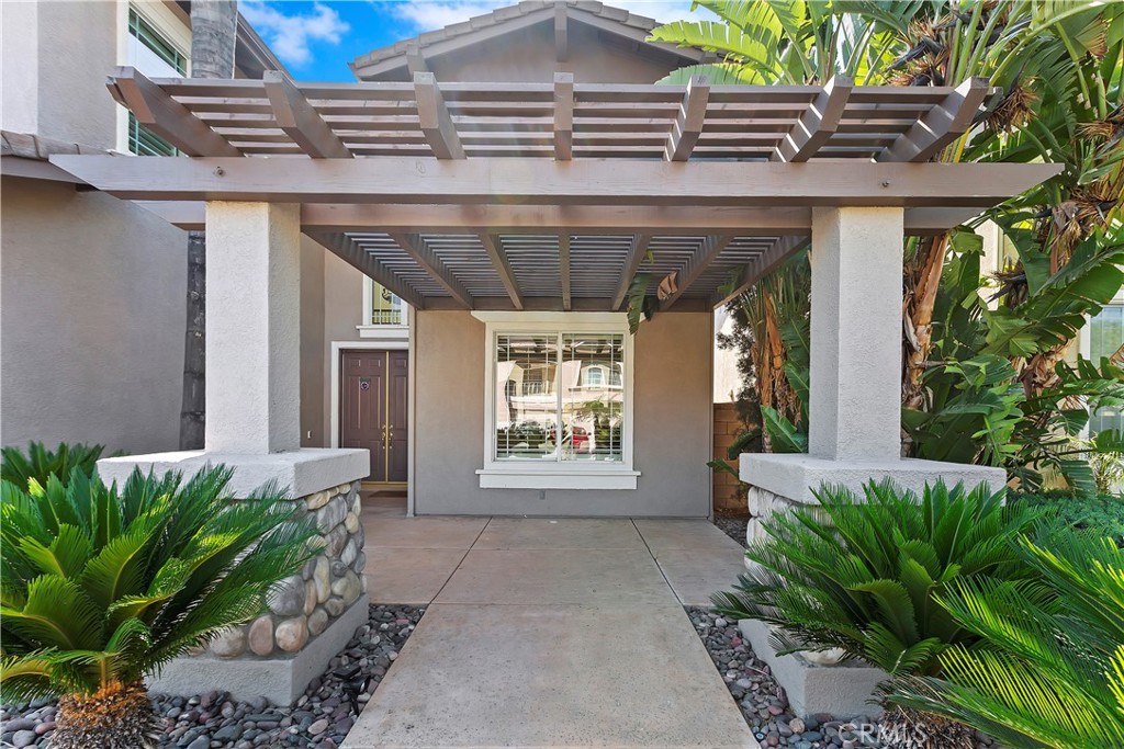 11416 Bridgeway Drive Riverside, CA 92505 - Photo 6 of 54 a front view of a house with a yard