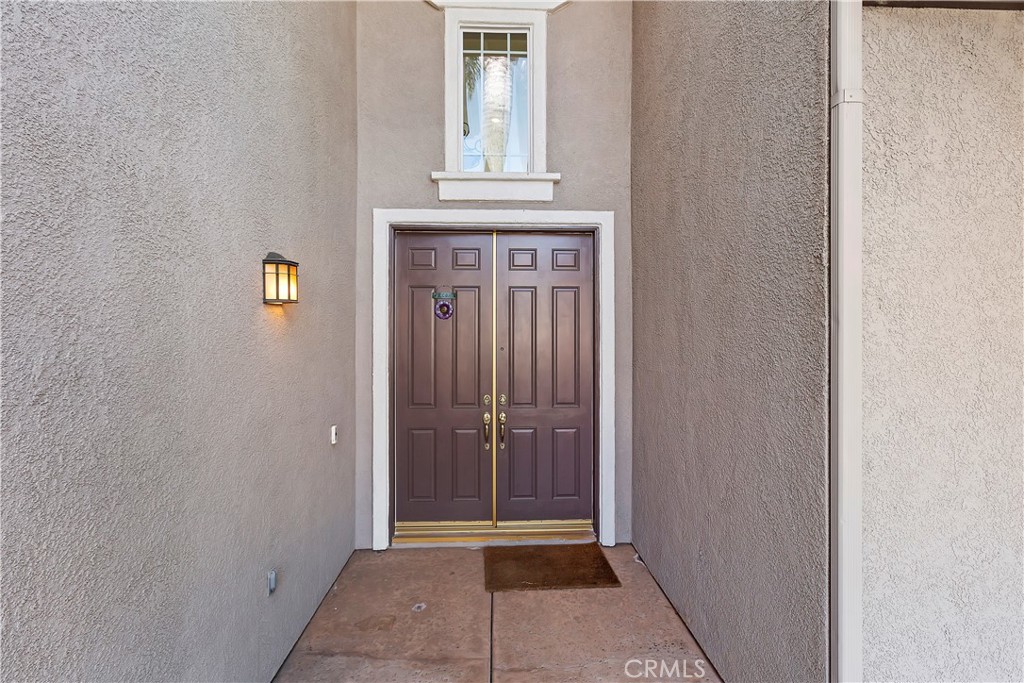 11416 Bridgeway Drive Riverside, CA 92505 - Photo 8 of 54 a view of front door with a door