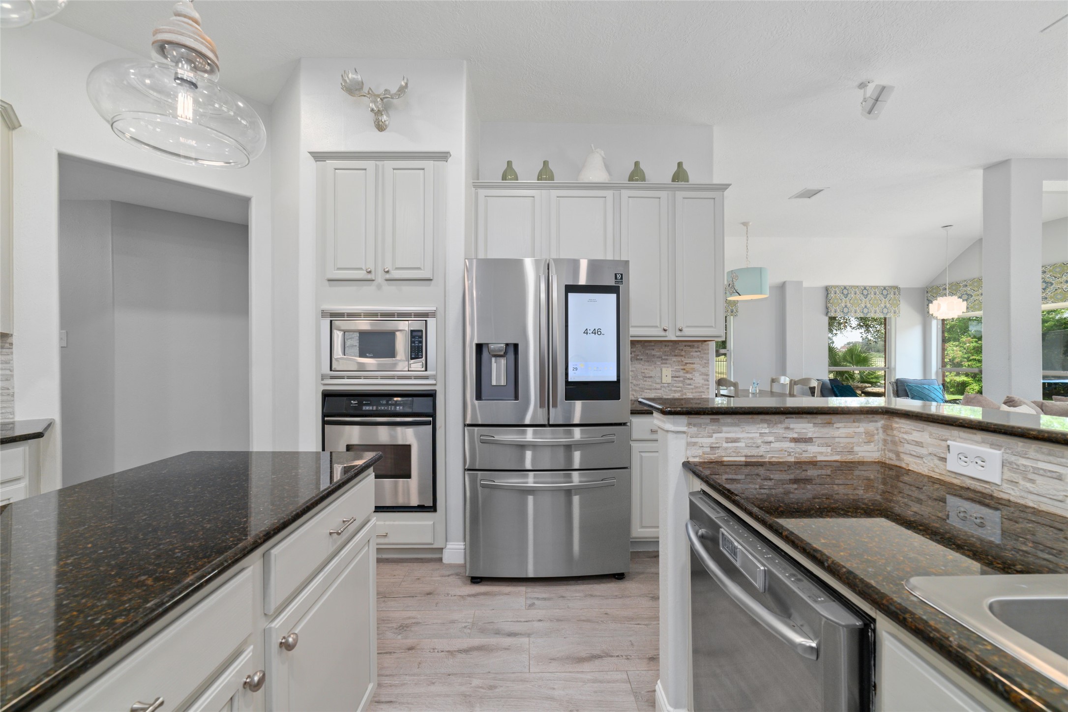 24203 Moon Ridge Court Katy, TX 77494 - Photo 12 of 43 Plenty of storage through out the kitchen!