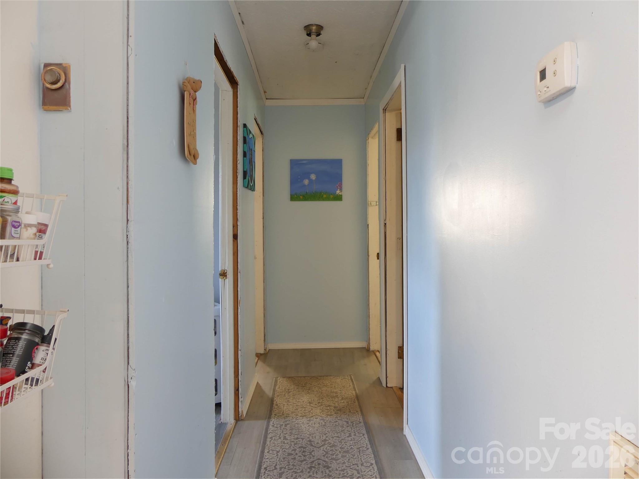 4636 Oak Hill School Road Lenoir, NC 28645 - Photo 13 of 23 a view of a hallway with closet