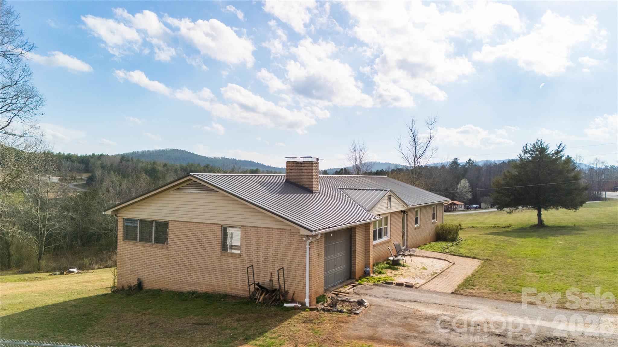 4636 Oak Hill School Road Lenoir, NC 28645 - Photo 4 of 23 an aerial view of a house