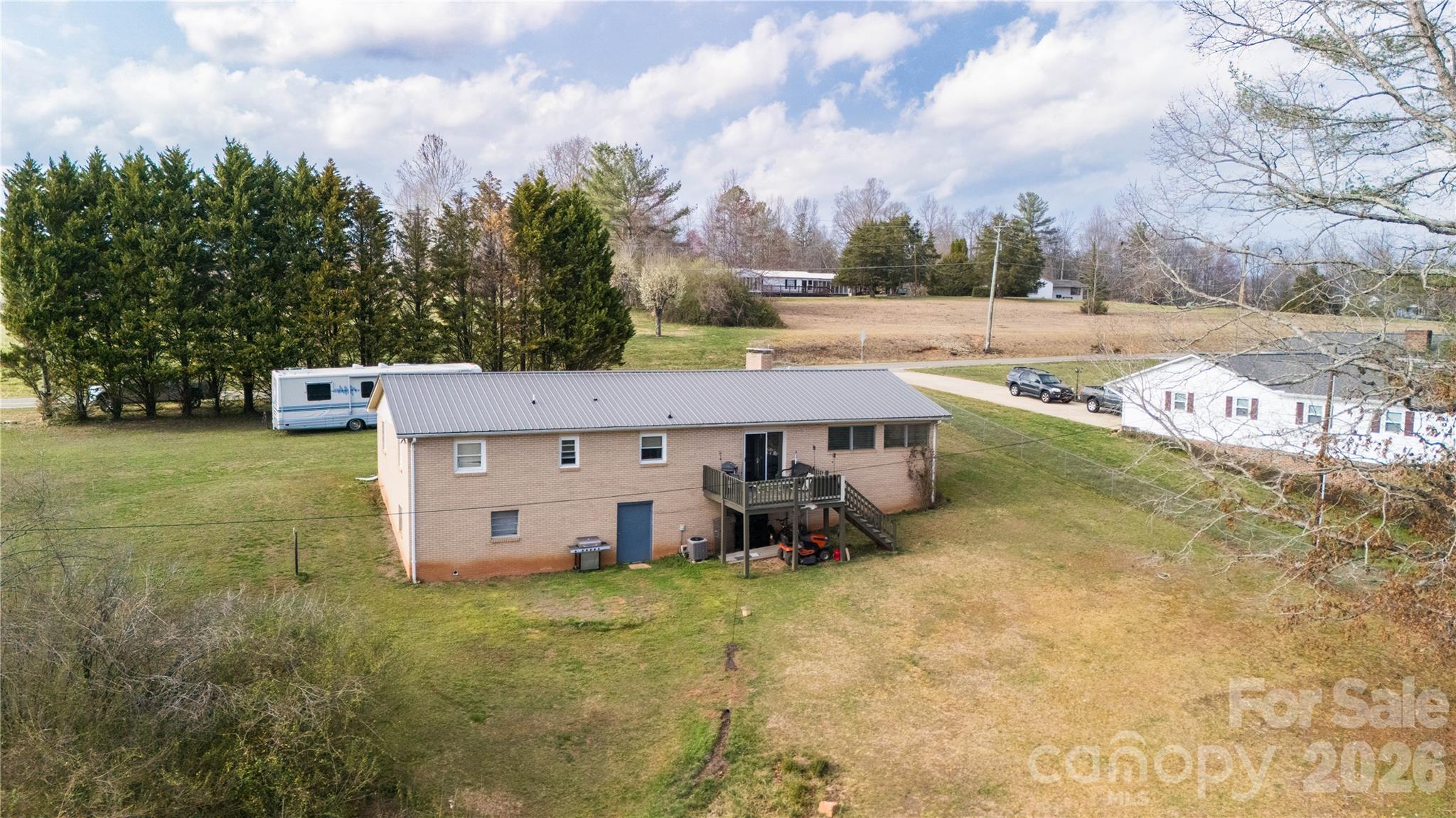 4636 Oak Hill School Road Lenoir, NC 28645 - Photo 5 of 23 a view of a house with a yard