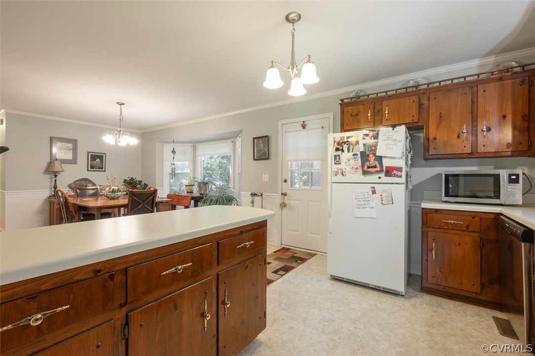 2734 Sutherland Road Sutherland, VA 23885 - Photo 12 of 28 a kitchen with sink cabinets and stove