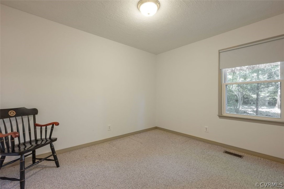 2734 Sutherland Road Sutherland, VA 23885 - Photo 18 of 28 an empty room with a window
