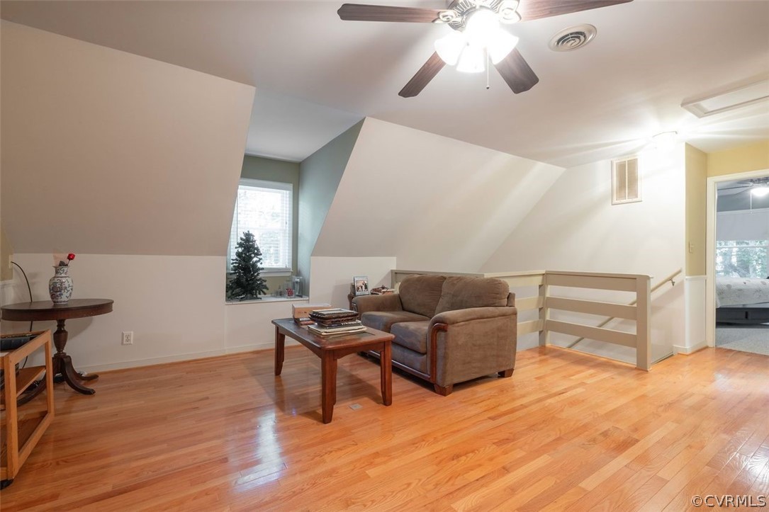 2734 Sutherland Road Sutherland, VA 23885 - Photo 19 of 28 a living room with furniture and a wooden floor