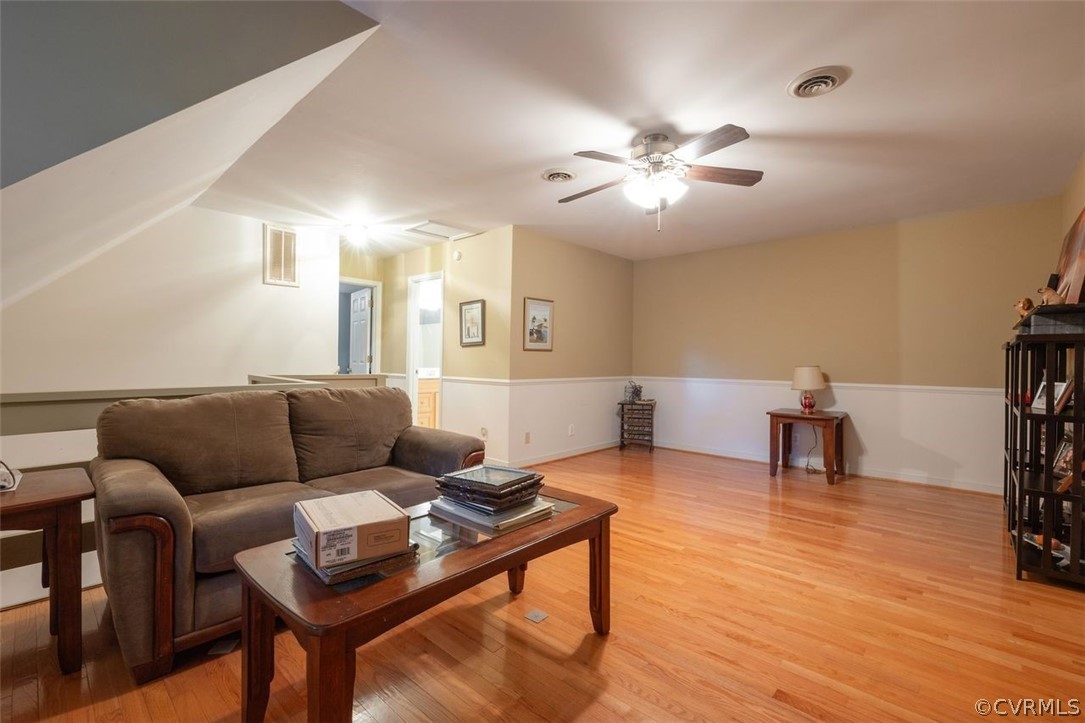 2734 Sutherland Road Sutherland, VA 23885 - Photo 20 of 28 a living room with furniture and a wooden floor
