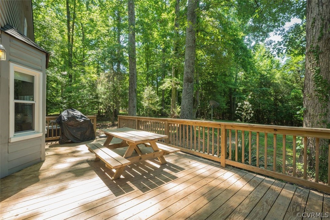 2734 Sutherland Road Sutherland, VA 23885 - Photo 24 of 28 a view of a patio with wooden floor