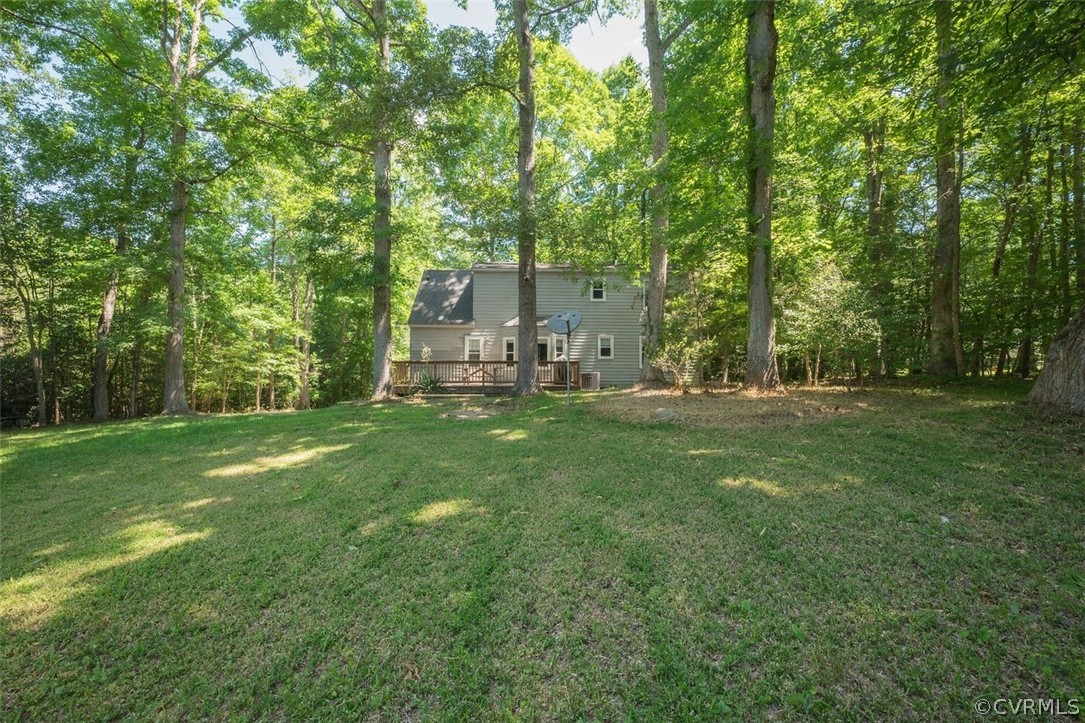 2734 Sutherland Road Sutherland, VA 23885 - Photo 25 of 28 a view of a house with a backyard