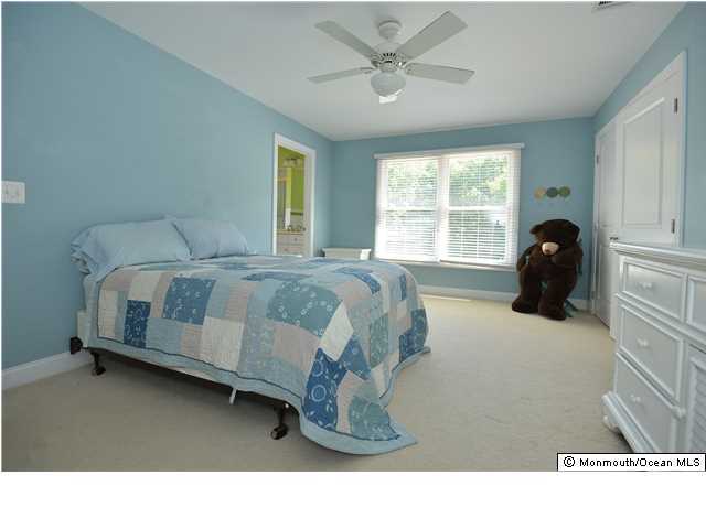 2103 Red Gate Road Allenwood, NJ 08720 - Photo 25 of 25 a bedroom with a bed and window