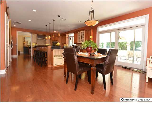 2103 Red Gate Road Allenwood, NJ 08720 - Photo 3 of 25 a dining room with furniture window and wooden floor