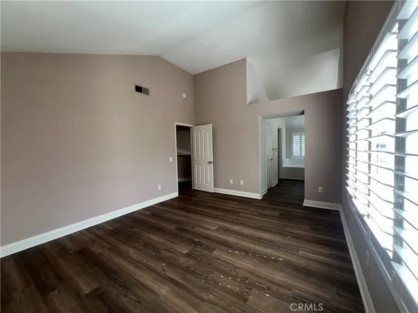 a view of an empty room and window