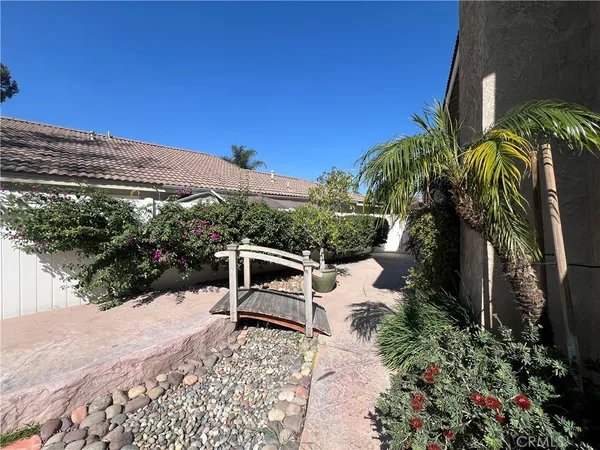a view of swimming pool with a patio