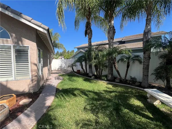a backyard of a house with lots of green space