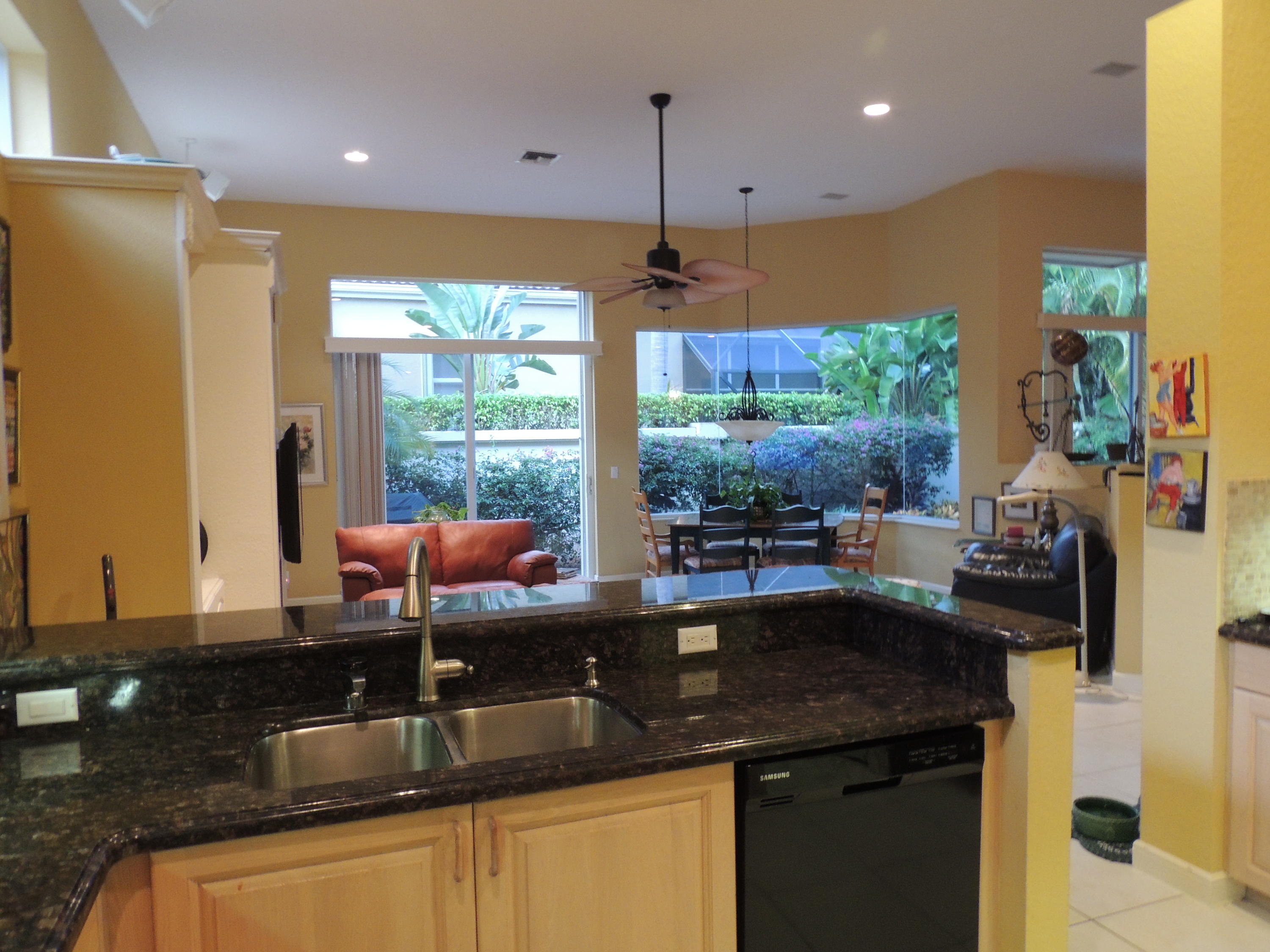 4281 Northwest 63rd Place Boca Raton, FL 33496 - Photo 10 of 44 KITCHEN OPEN TO FAMILY ROOM
