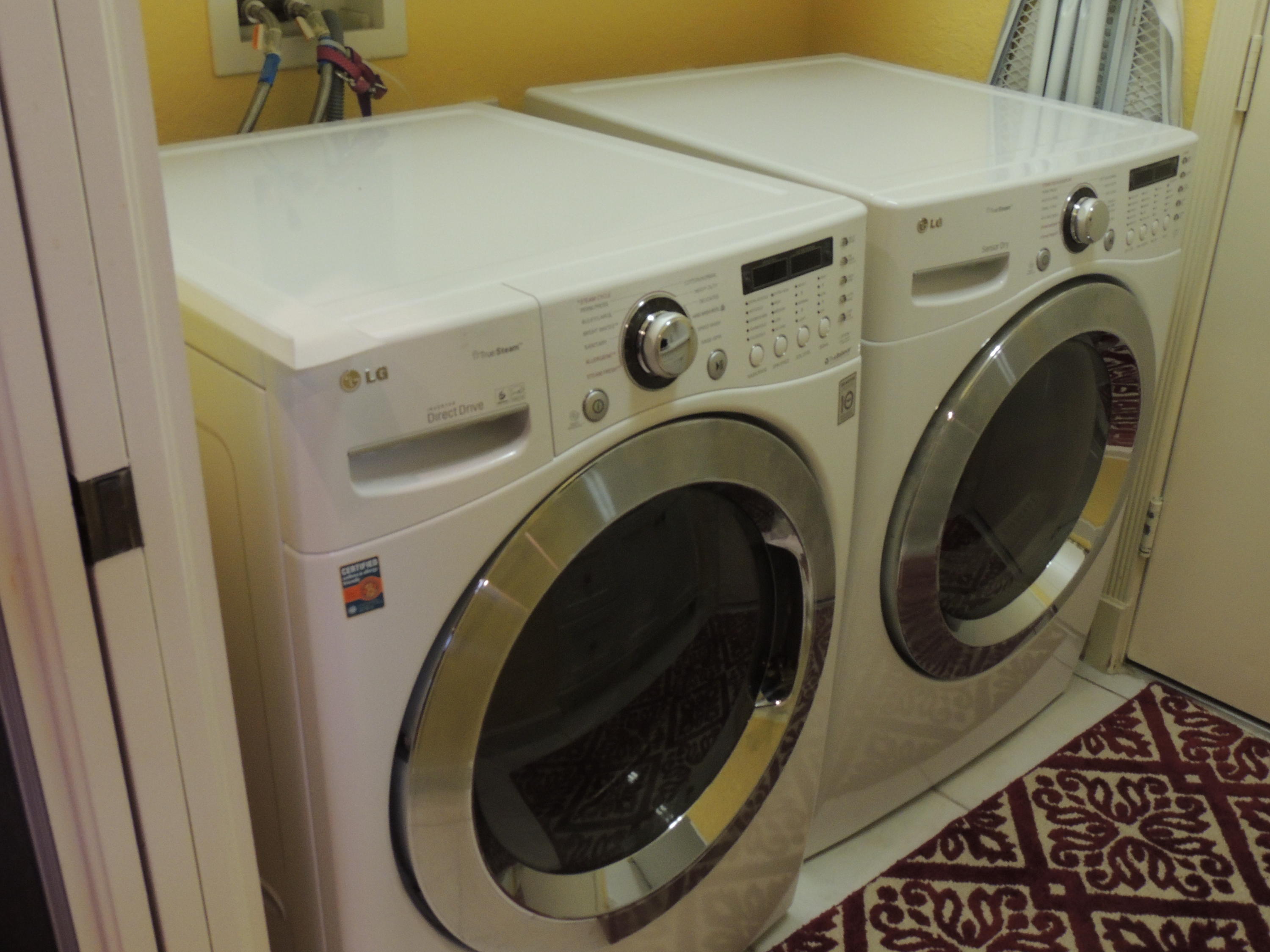 4281 Northwest 63rd Place Boca Raton, FL 33496 - Photo 21 of 44 NEWER FRONT LOAD WASHER/DRYER