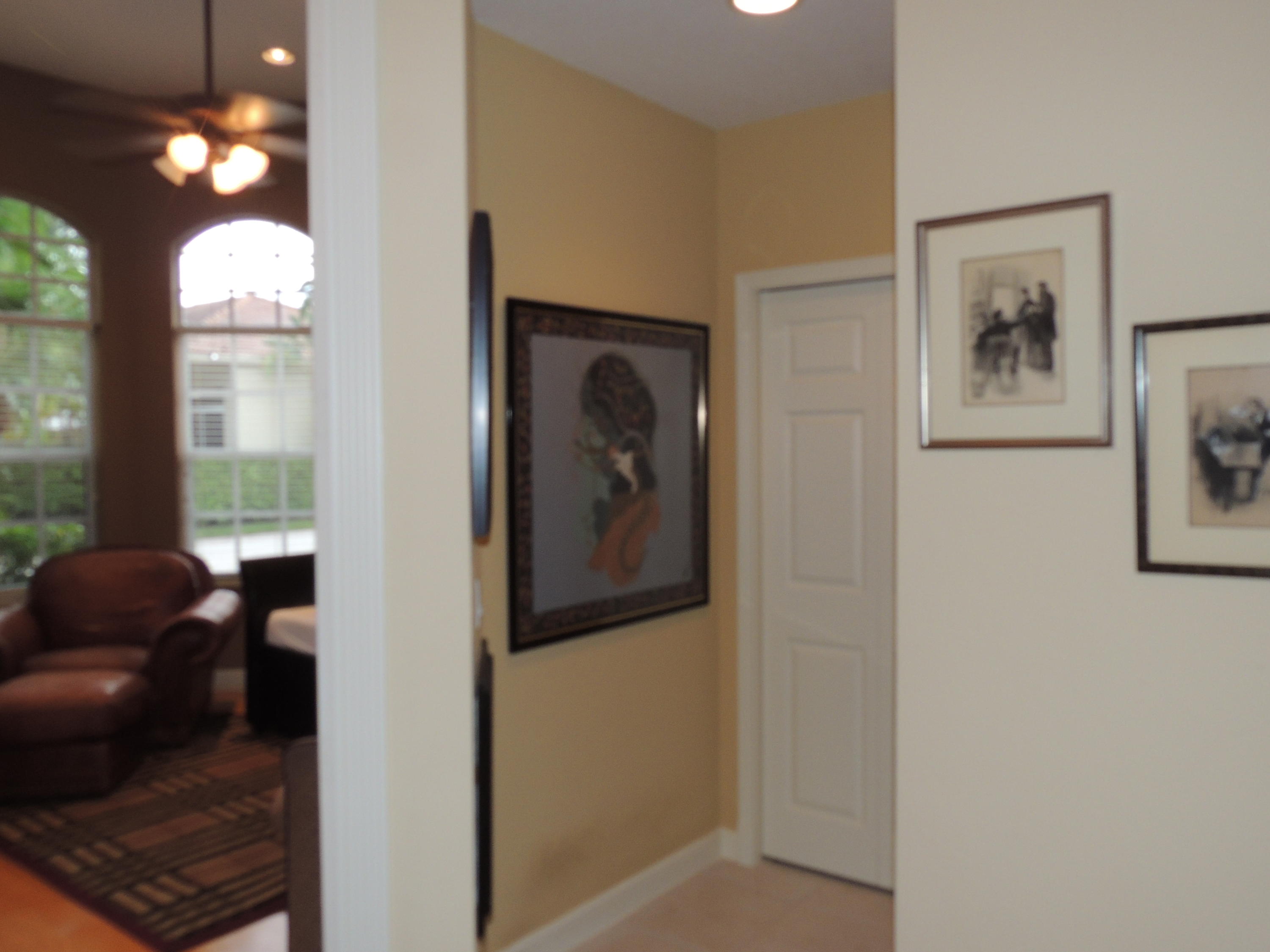 4281 Northwest 63rd Place Boca Raton, FL 33496 - Photo 27 of 44 HALLWAY OFF FOYER