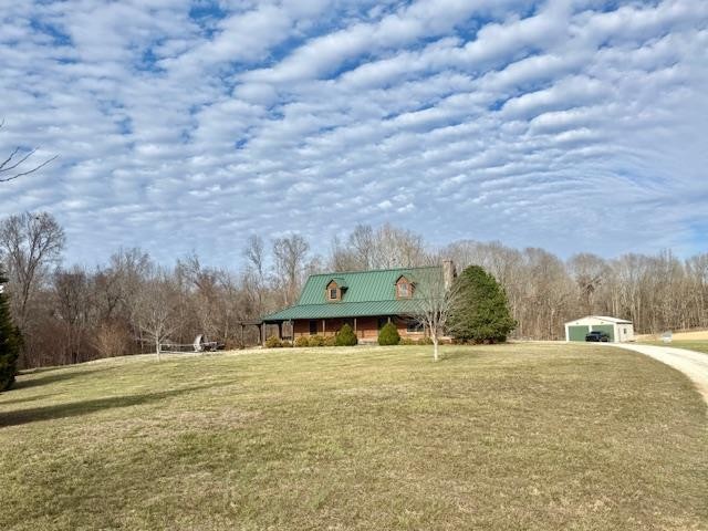 955 Martin Mill Road Puryear, TN 38251 - Photo 2 of 55 a view of a field with mountains in the background