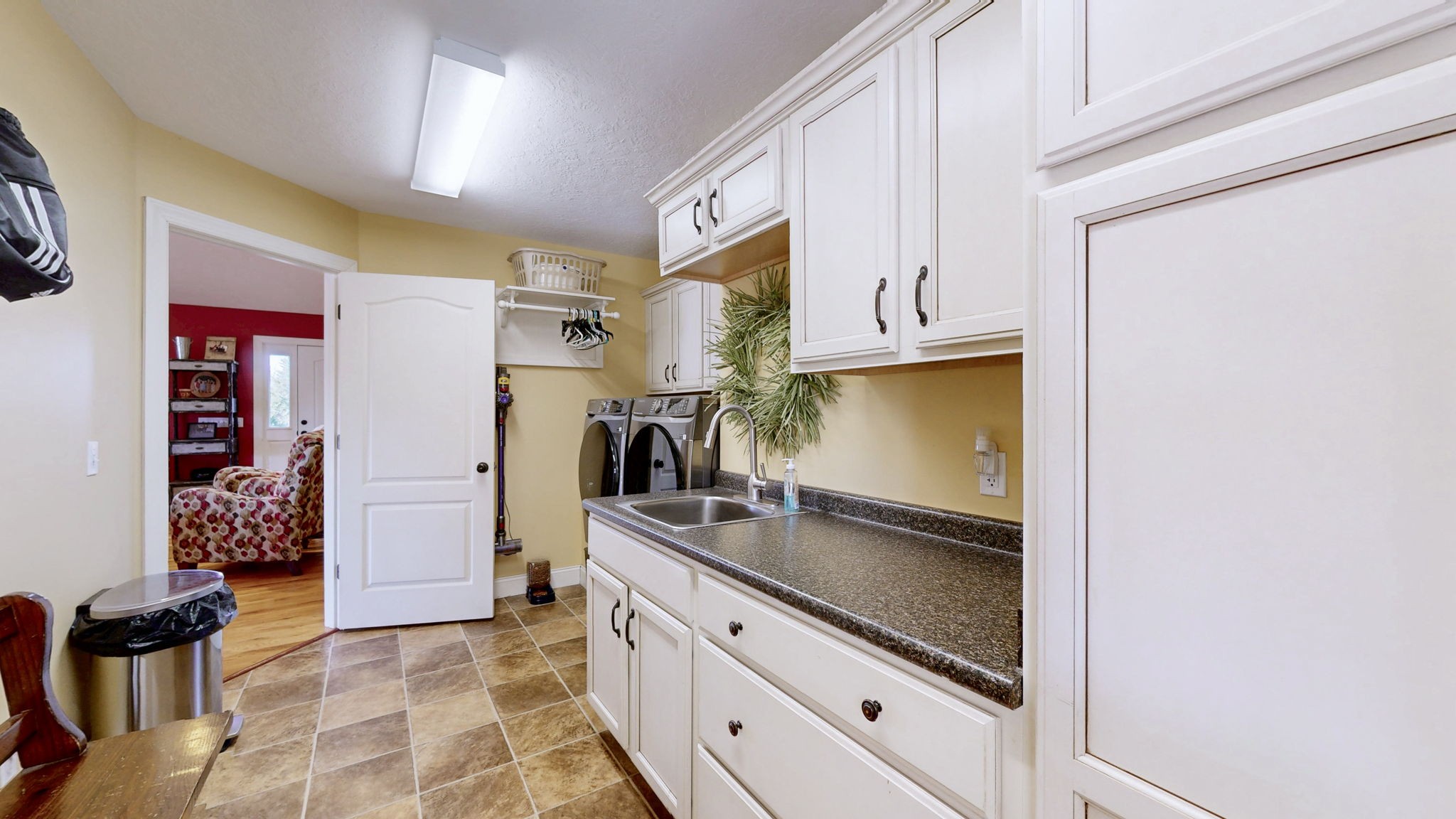 955 Martin Mill Road Puryear, TN 38251 - Photo 22 of 55 a kitchen with stainless steel appliances granite countertop a refrigerator and a stove