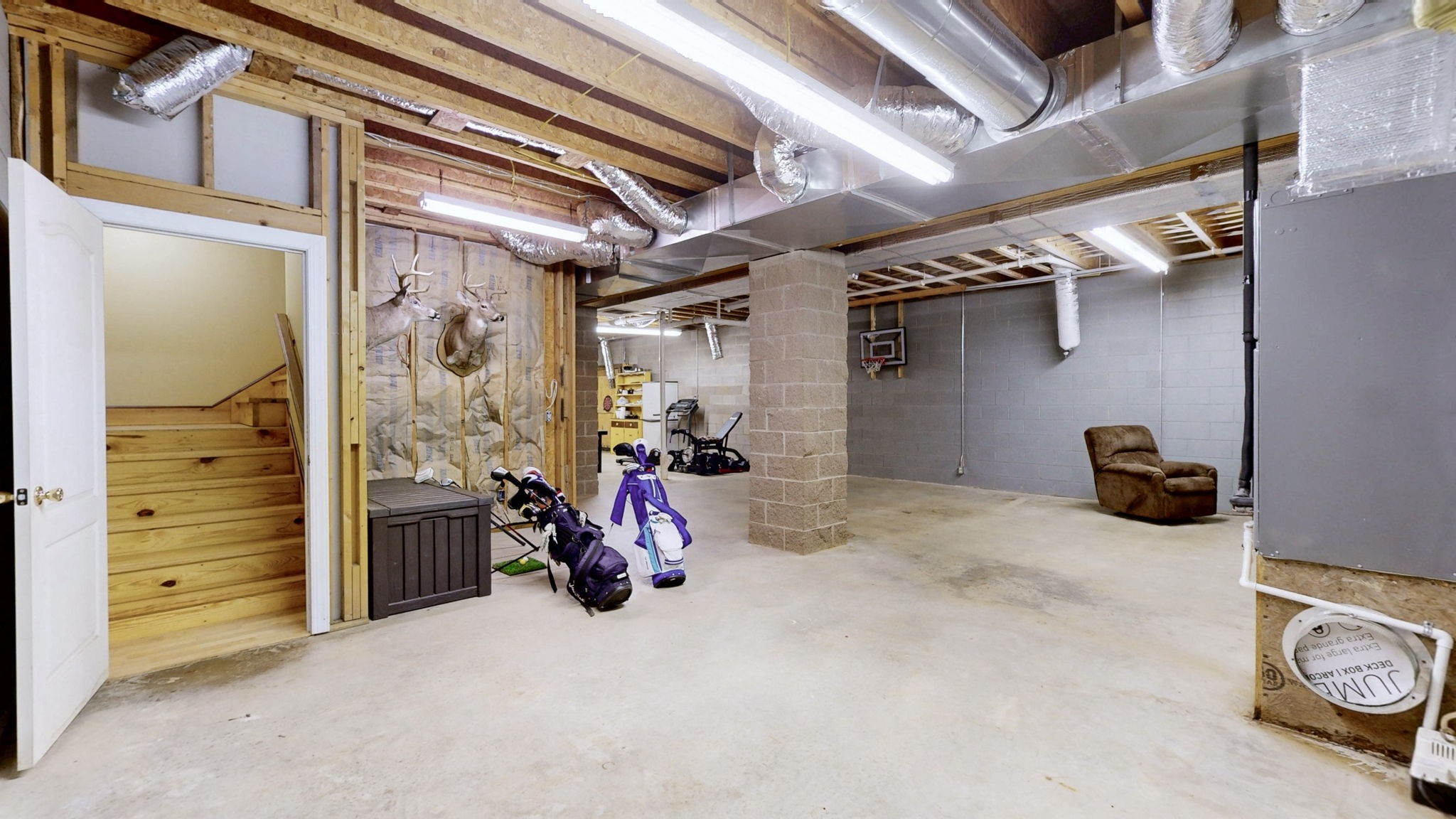 955 Martin Mill Road Puryear, TN 38251 - Photo 23 of 55 a view of a storage room with shelves