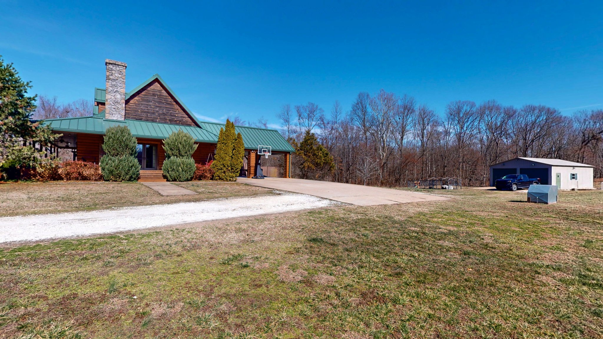 955 Martin Mill Road Puryear, TN 38251 - Photo 29 of 55 a view of the house with a yard