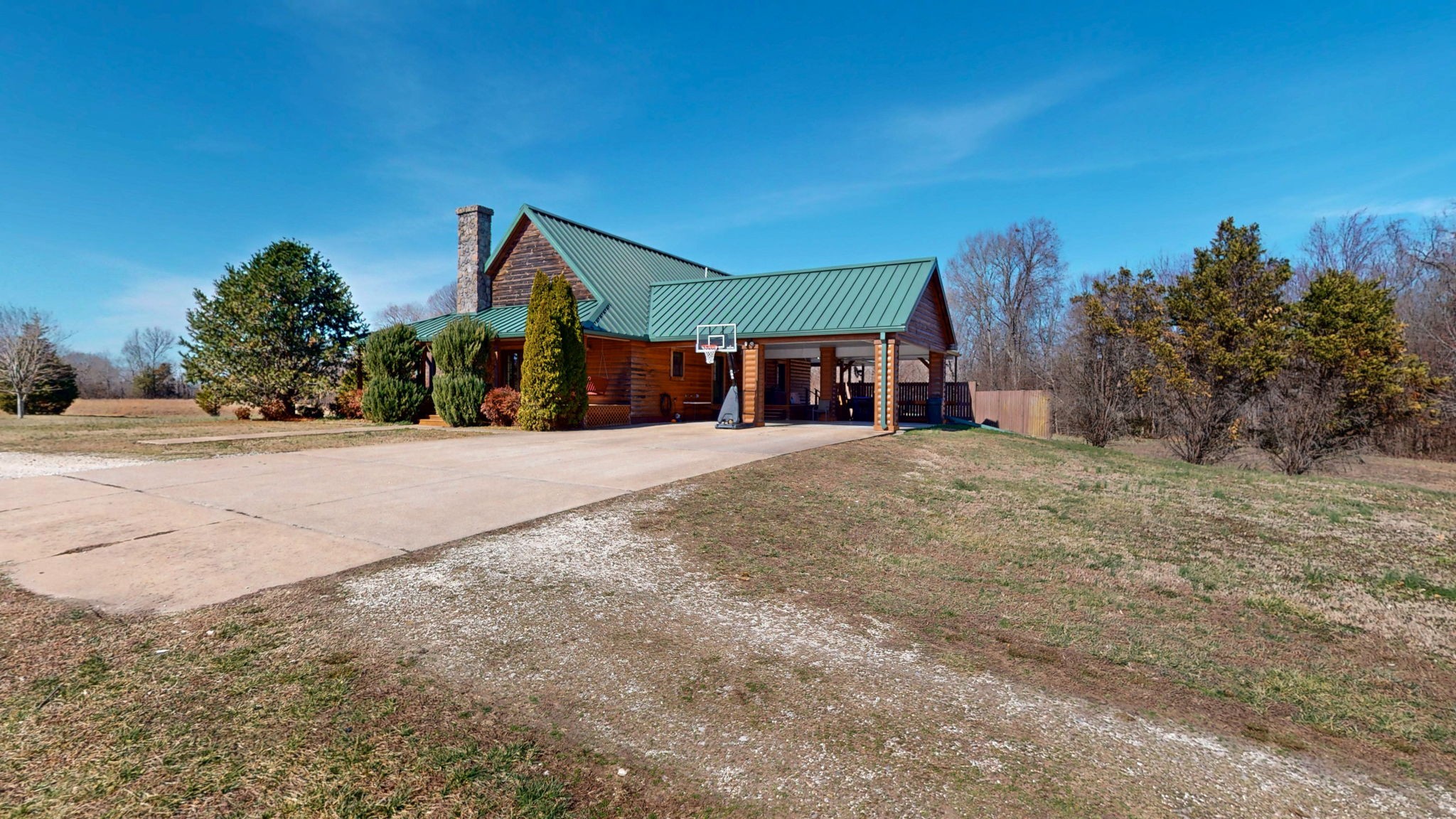 955 Martin Mill Road Puryear, TN 38251 - Photo 30 of 55 a view of a house with a outdoor space
