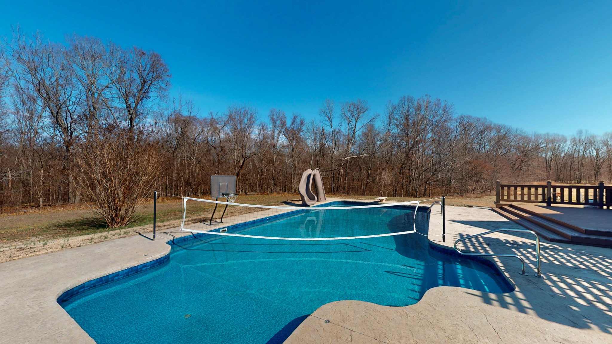 955 Martin Mill Road Puryear, TN 38251 - Photo 33 of 55 a view of a swimming pool with a patio
