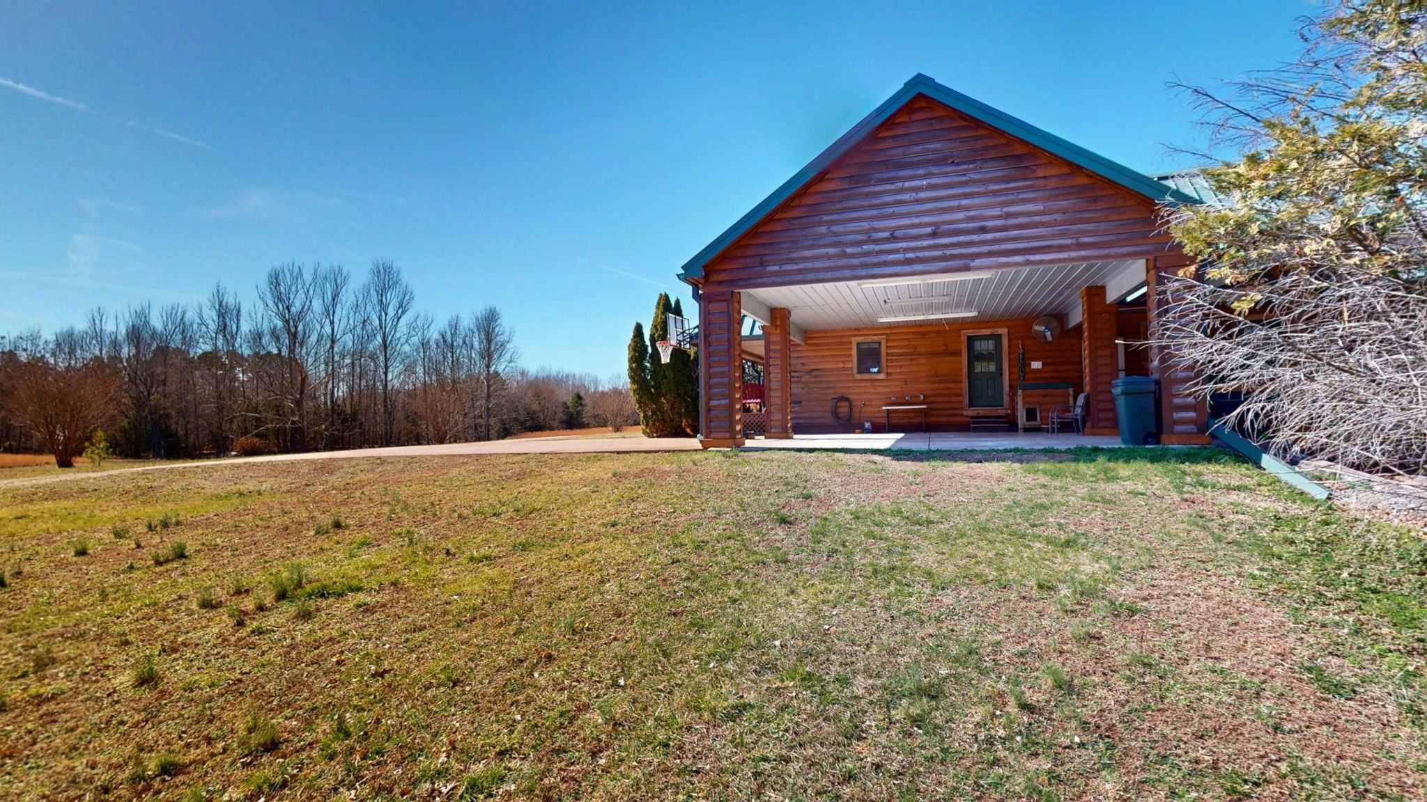 955 Martin Mill Road Puryear, TN 38251 - Photo 37 of 55 a view of a house with a yard