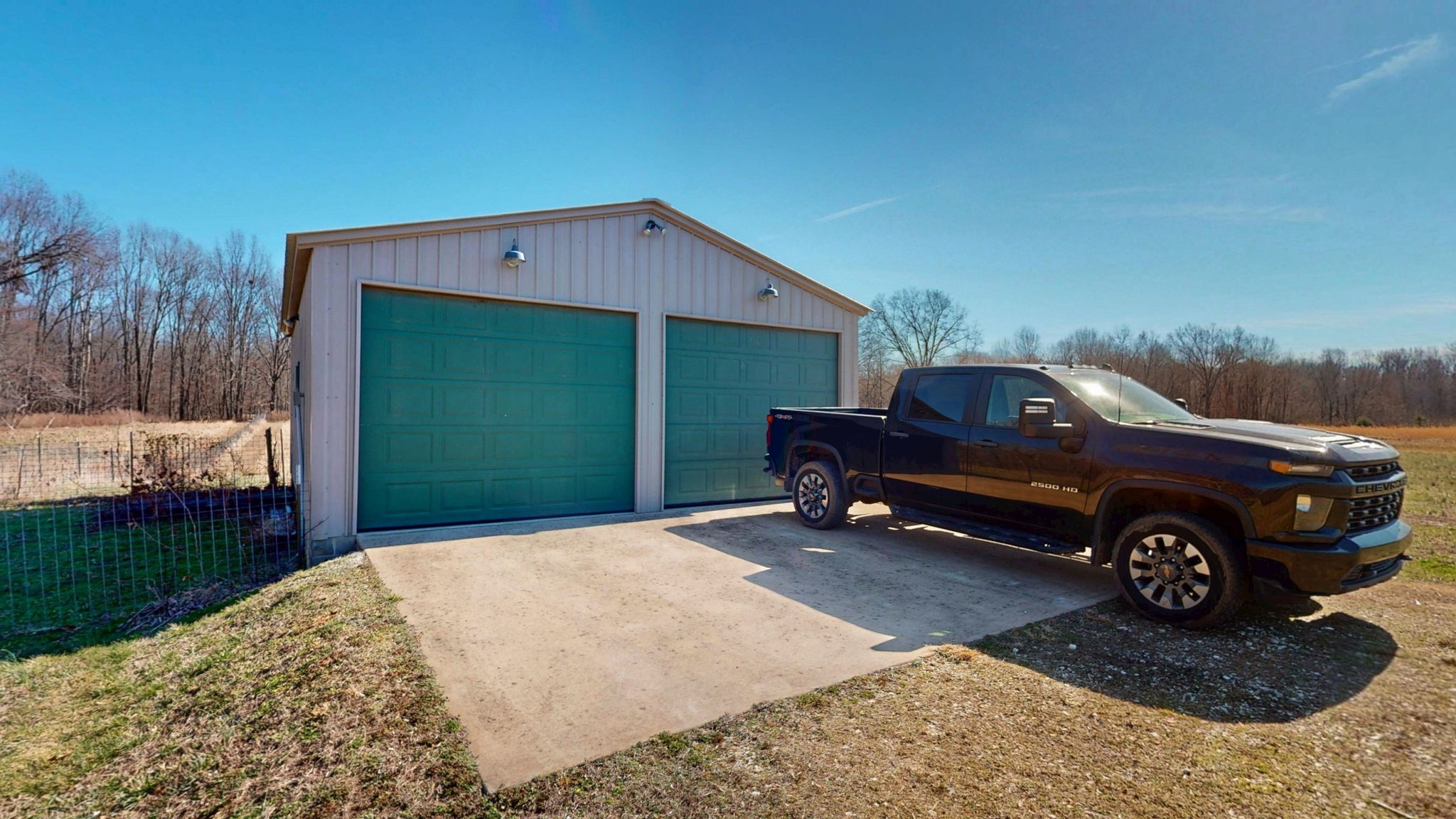 955 Martin Mill Road Puryear, TN 38251 - Photo 41 of 55 a front view of a house with a garden