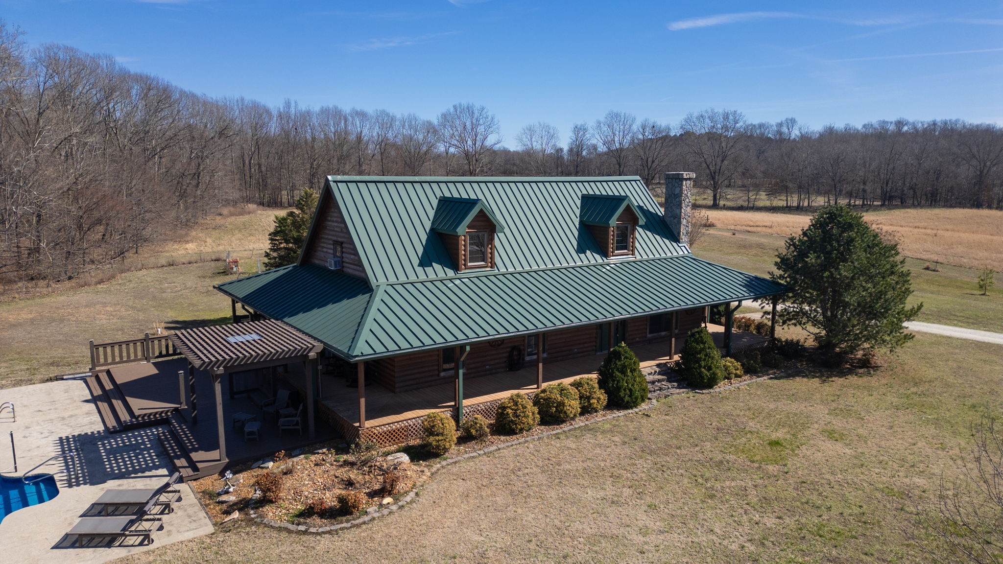 955 Martin Mill Road Puryear, TN 38251 - Photo 44 of 55 a view of a house with a patio
