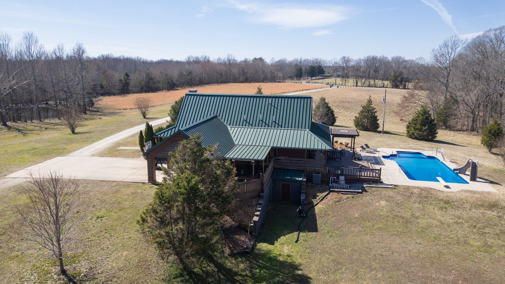 955 Martin Mill Road Puryear, TN 38251 - Photo 47 of 55 a view of a terrace with a bench and lake view