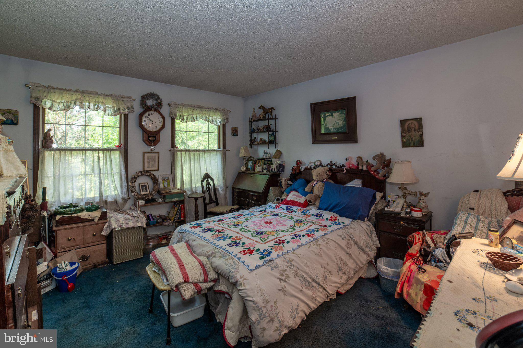 911 Monmouth Road New Egypt, NJ 08533 - Photo 16 of 19 Charming bedroom with vintage decor.