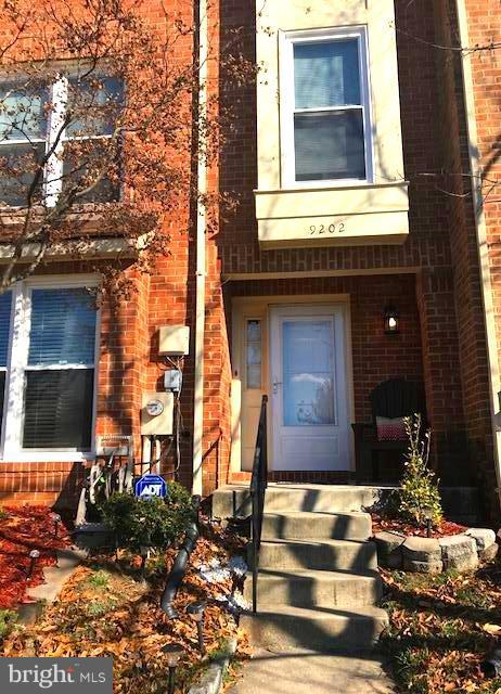 9202 Oregold Court Laurel, MD 20708 - Photo 1 of 29 a front view of a house with a yard